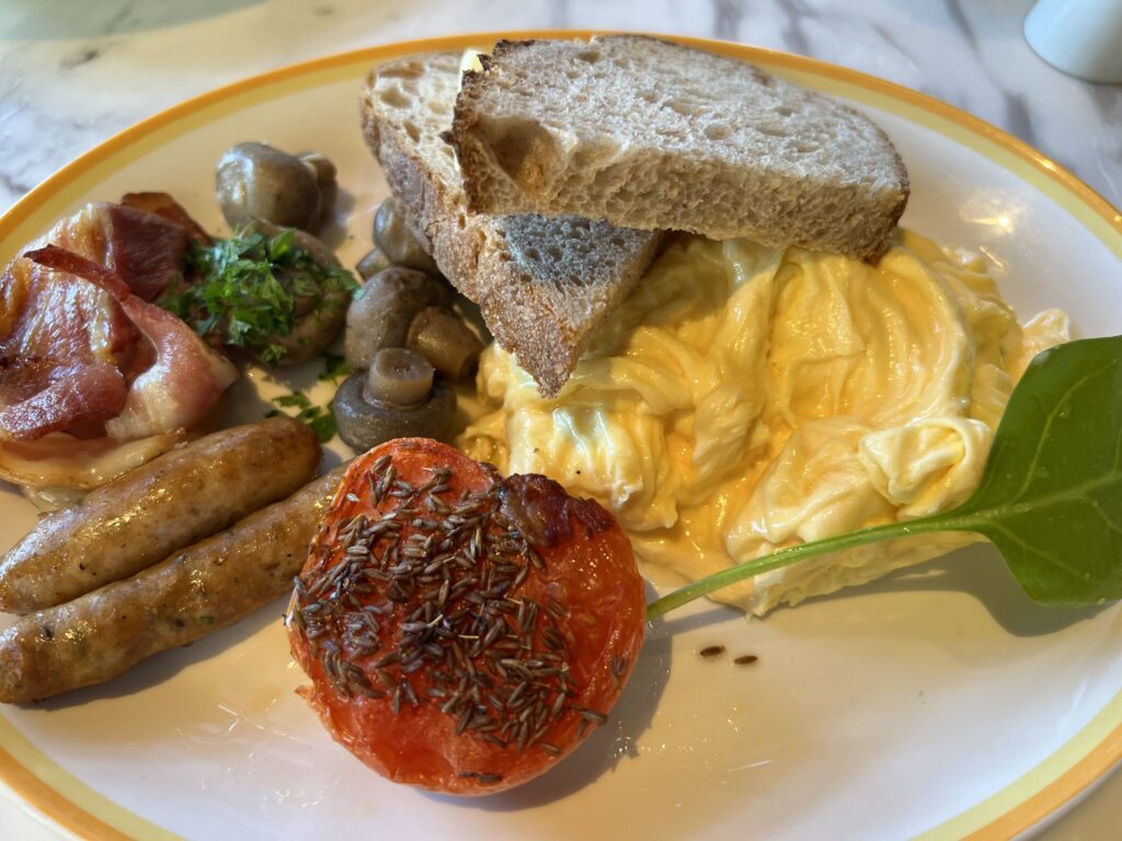 Full Aussie Breakfast with Scrambled Eggs, Toast, Mushrooms, Bacon, Roast Tomato