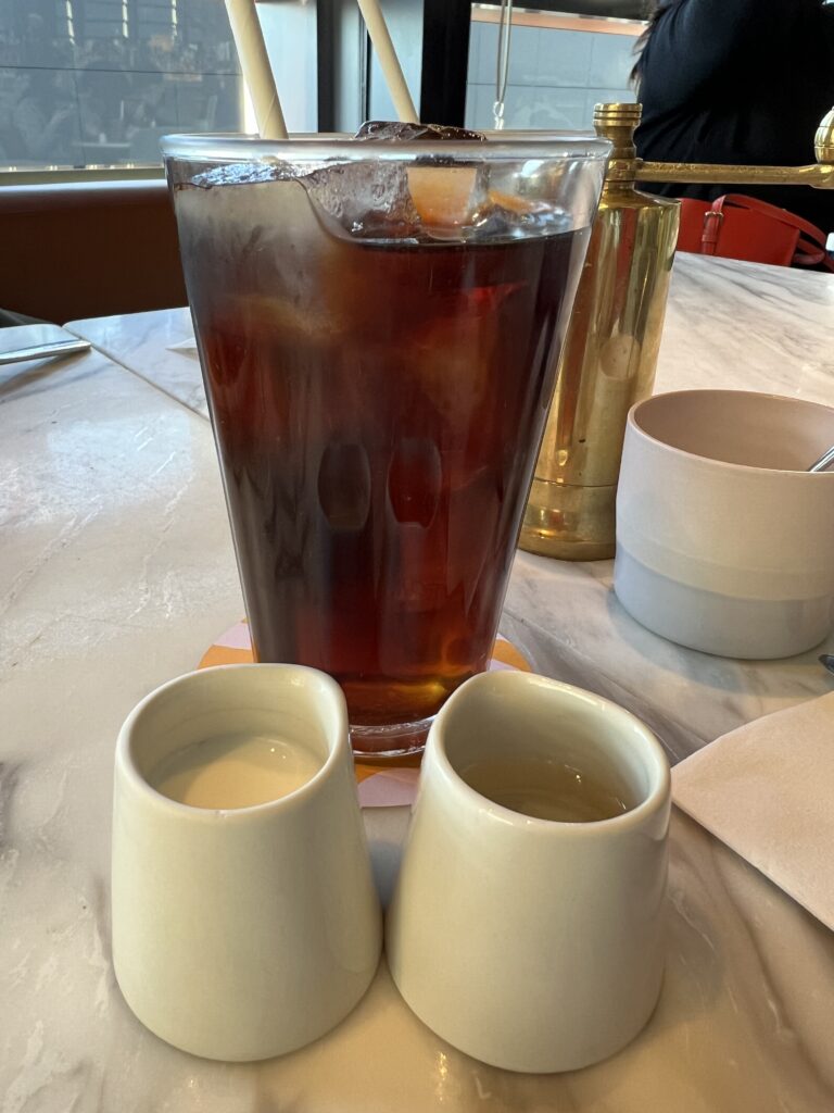 americano served with Milk and Syrup